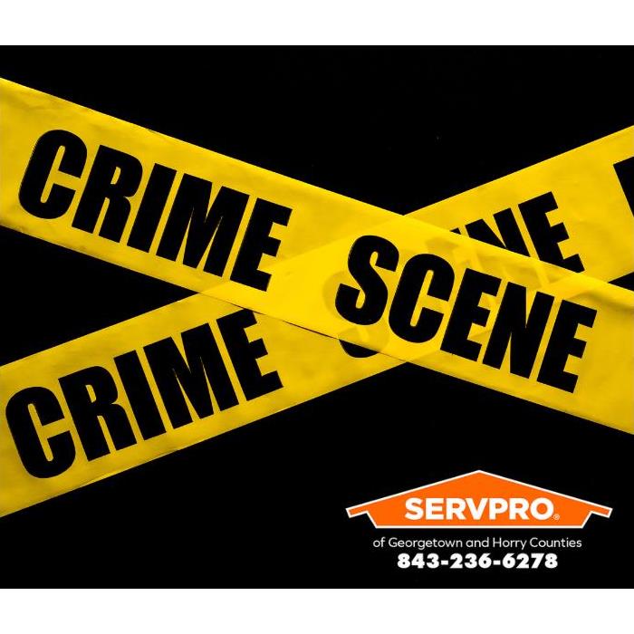 Crime scene tape delineates an active crime scene investigation.